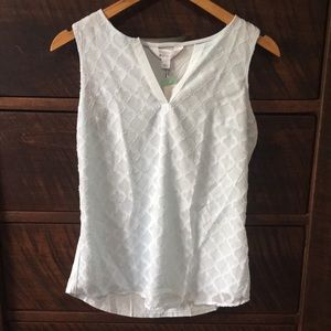 Light blue sleeveless blouse